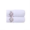 2 white face towels