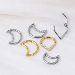 Trendy septum piercing do nosu ve tvaru slzy nebo půlměsíce